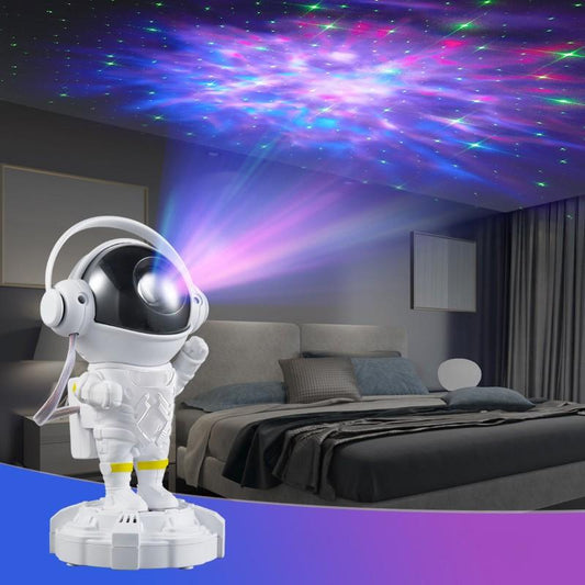 Proyector astronauta con altavoz bluetooth.